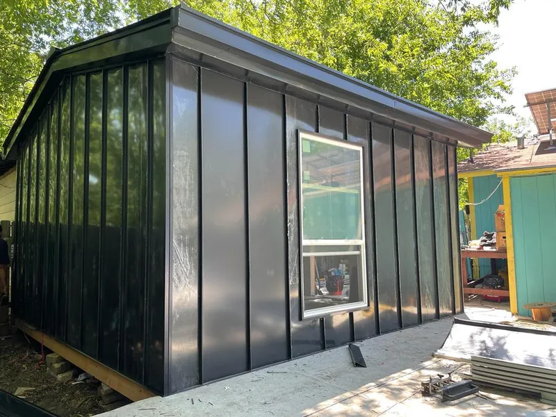 Black standing seam metal wall panels for Metal Roof Installation in Spring Valley